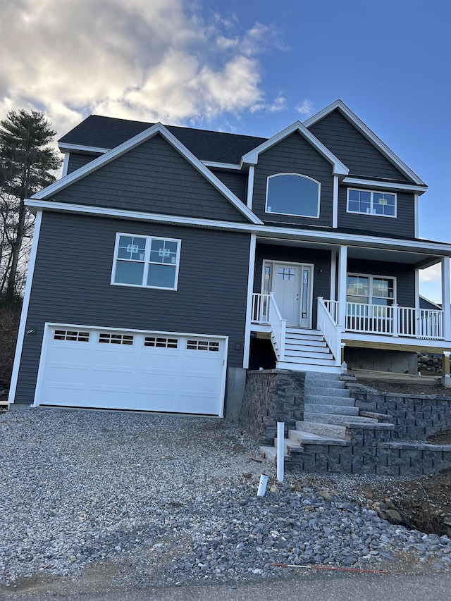 3 Mulligan Way Unit 3, Kingston, NH 03848 - view of front of home featuring a garage, driveway, and a porch