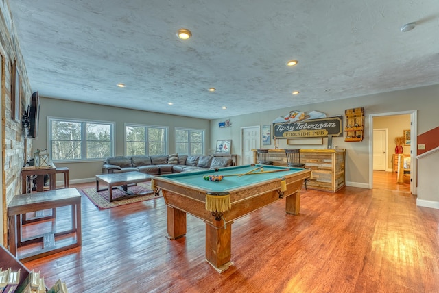 game room featuring wood-type flooring and pool table