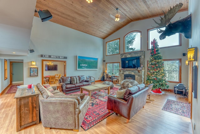 living room with high vaulted ceiling, wooden ceiling, and light hardwood / wood-style flooring