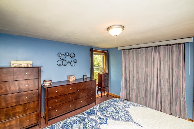 bedroom featuring hardwood / wood-style floors