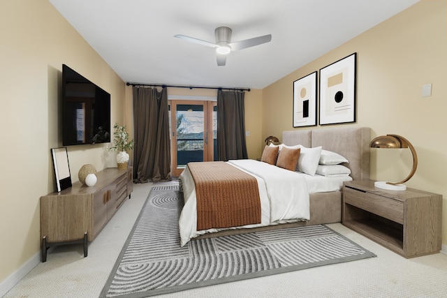 bedroom with light colored carpet and ceiling fan