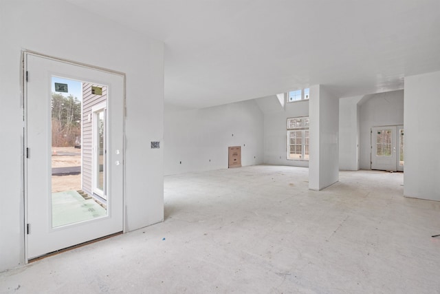 unfurnished living room with a healthy amount of sunlight