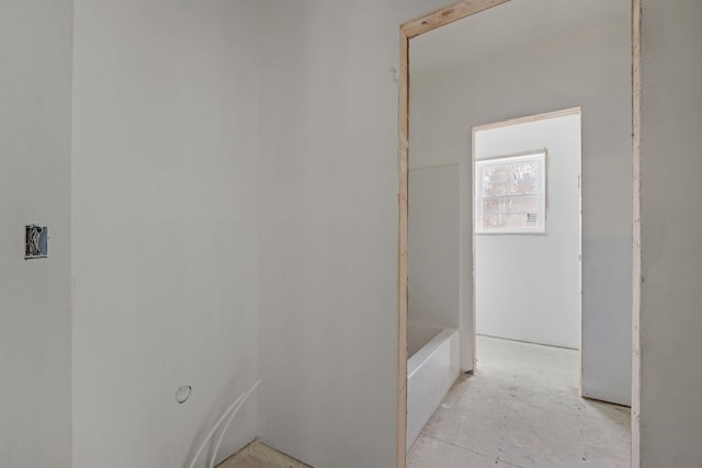 bathroom featuring a washtub