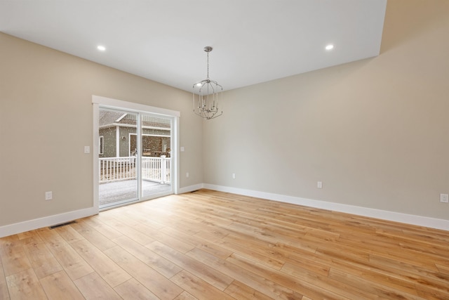276 Sterling Dr, Laconia, NH 03246 - empty room featuring a chandelier, baseboards, light wood-type flooring, and recessed lighting