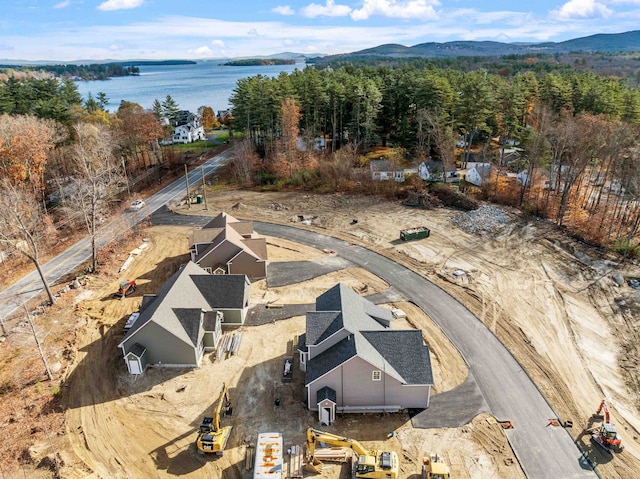 bird's eye view featuring a water and mountain view