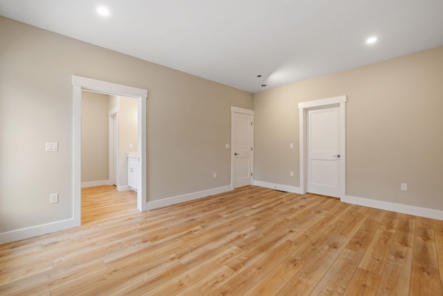276 Sterling Dr, Laconia, NH 03246 - unfurnished bedroom featuring light wood-type flooring, baseboards, recessed lighting, and ensuite bath
