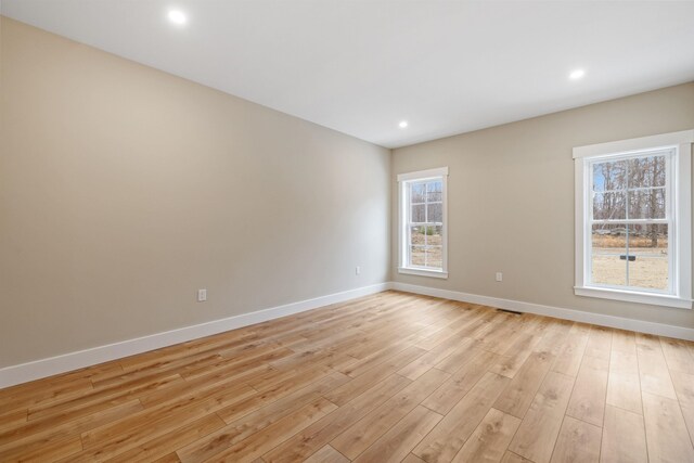276 Sterling Dr, Laconia, NH 03246 - unfurnished room featuring baseboards, light wood finished floors, and recessed lighting