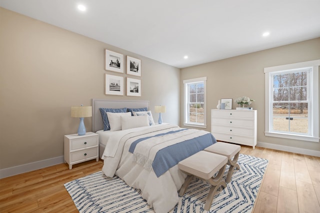 276 Sterling Dr, Laconia, NH 03246 - bedroom featuring multiple windows, light wood finished floors, baseboards, and recessed lighting