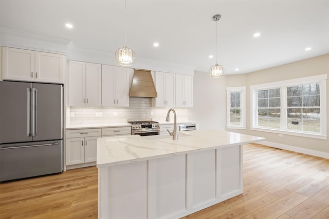 276 Sterling Dr, Laconia, NH 03246 - kitchen featuring stainless steel appliances, premium range hood, white cabinets, light wood-type flooring, and recessed lighting