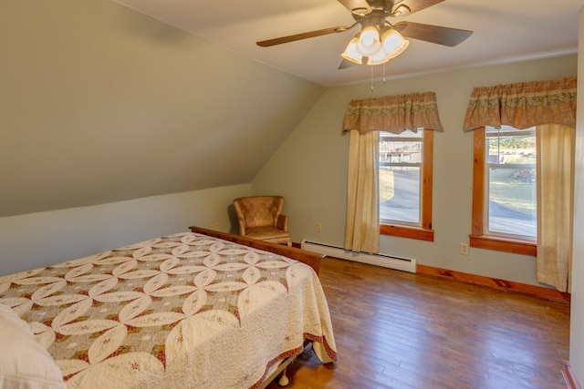 bedroom with wood finished floors, lofted ceiling, baseboard heating, and ceiling fan
