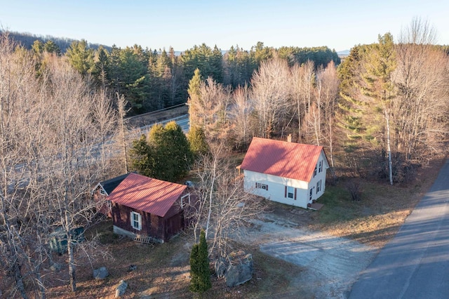 aerial view with a wooded view