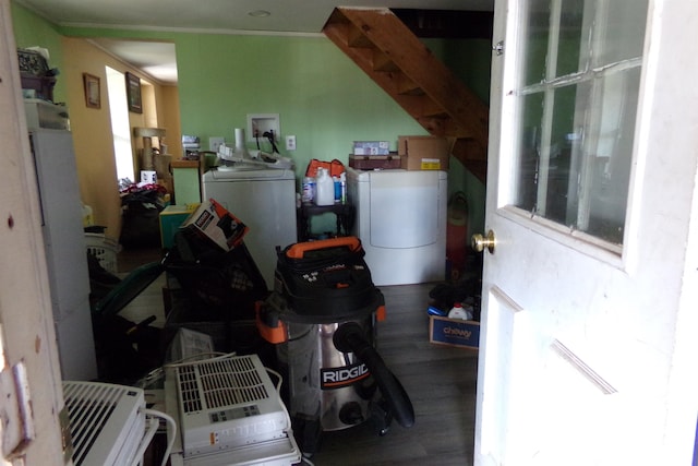 interior space with wood-type flooring and washer / dryer
