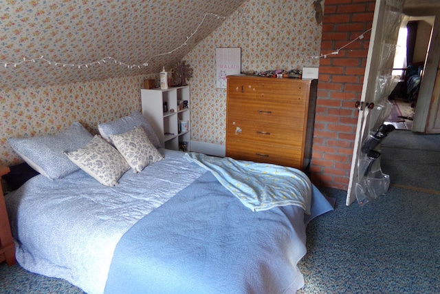 bedroom with carpet flooring and lofted ceiling