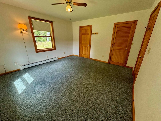 interior space with ceiling fan, baseboard heating, and carpet flooring