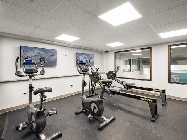 workout area with a drop ceiling