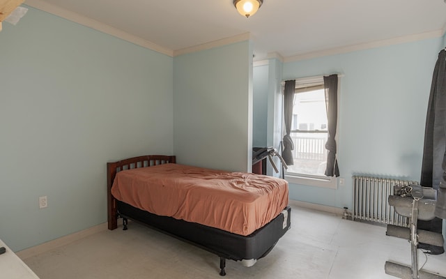 bedroom featuring radiator and crown molding