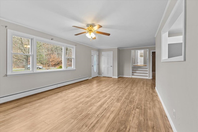 unfurnished living room with ceiling fan, ornamental molding, a baseboard radiator, and light wood-type flooring