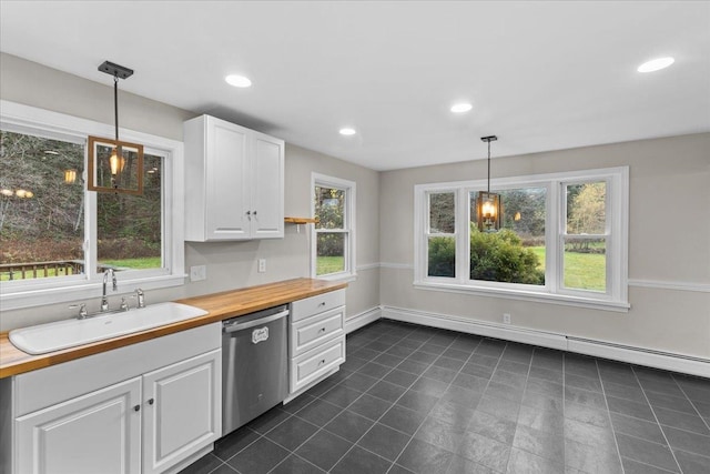 kitchen with sink, decorative light fixtures, dishwasher, white cabinetry, and plenty of natural light