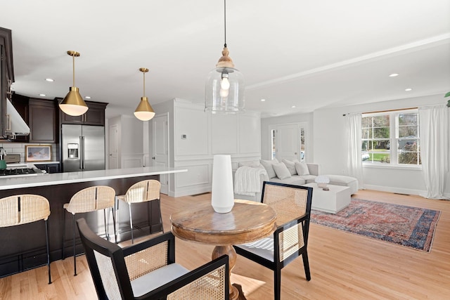 dining room featuring light hardwood / wood-style floors