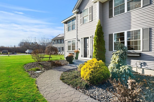 exterior space with a lawn