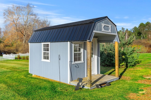 view of outdoor structure with a yard