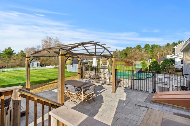 view of patio with a pergola and a fenced in pool