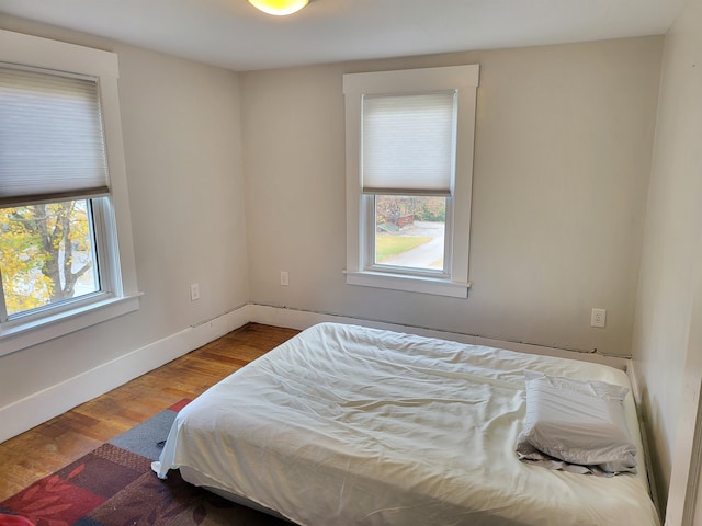 bedroom featuring hardwood / wood-style floors