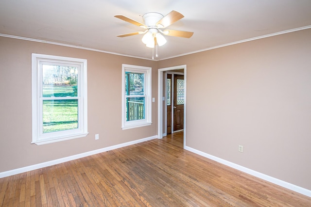 390 Simonds Rd, Dalton, NH 03598 - spare room featuring baseboards, wood finished floors, a ceiling fan, and ornamental molding