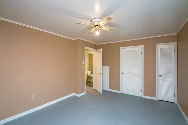 unfurnished bedroom featuring concrete flooring, crown molding, ceiling fan, and multiple closets