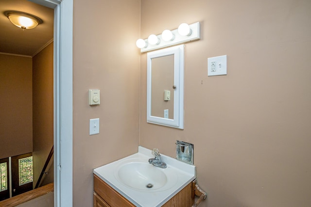 390 Simonds Rd, Dalton, NH 03598 - bathroom with crown molding and vanity