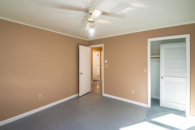 390 Simonds Rd, Dalton, NH 03598 - unfurnished bedroom featuring ornamental molding, baseboards, a closet, and a ceiling fan
