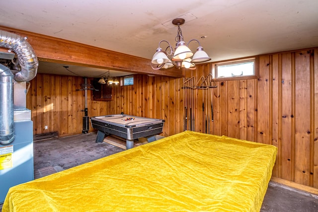 game room with wooden walls