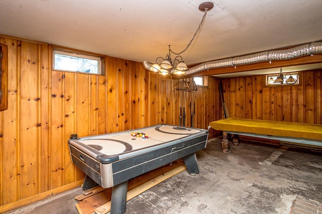 playroom featuring wood walls