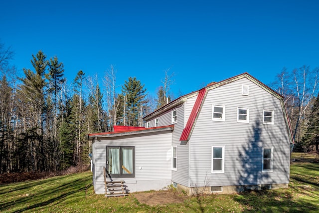 390 Simonds Rd, Dalton, NH 03598 - back of property with a lawn, a gambrel roof, and entry steps