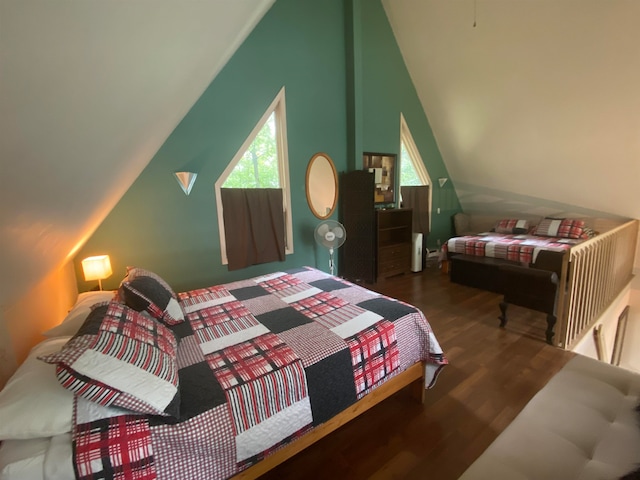 bedroom with dark wood-type flooring