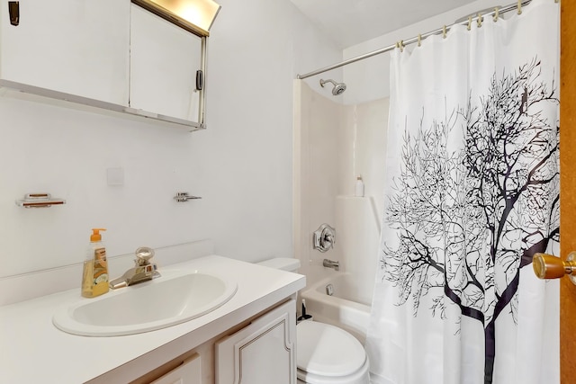 full bathroom with shower / tub combo, vanity, and toilet