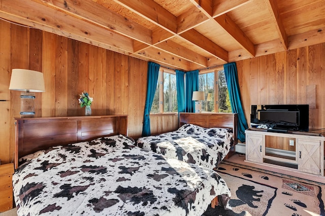 bedroom with beamed ceiling, wooden ceiling, and wooden walls