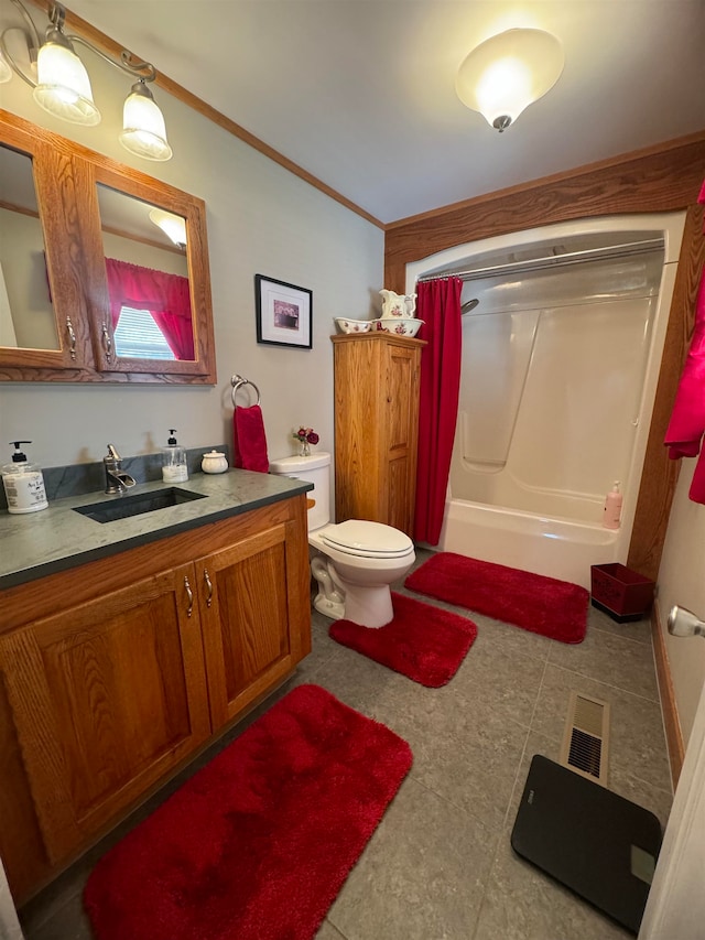 full bathroom with tile patterned flooring, bathing tub / shower combination, toilet, vanity, and ornamental molding