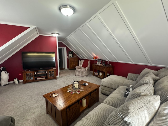 carpeted living room with lofted ceiling