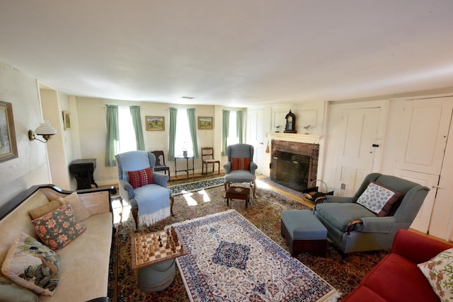 living room featuring a fireplace