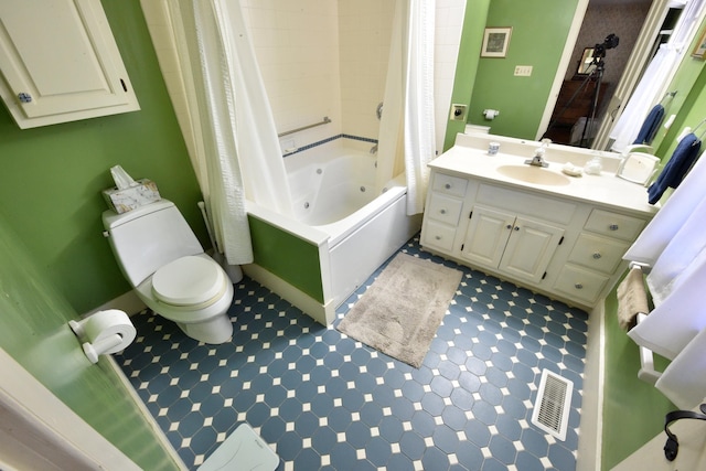 full bathroom with vanity, toilet, and shower / tub combo with curtain