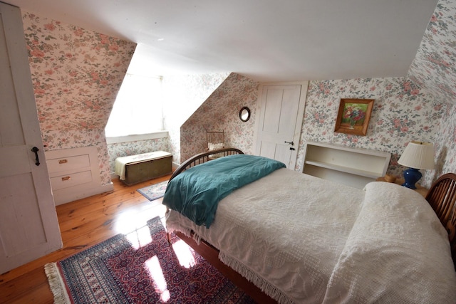 bedroom featuring wood-type flooring