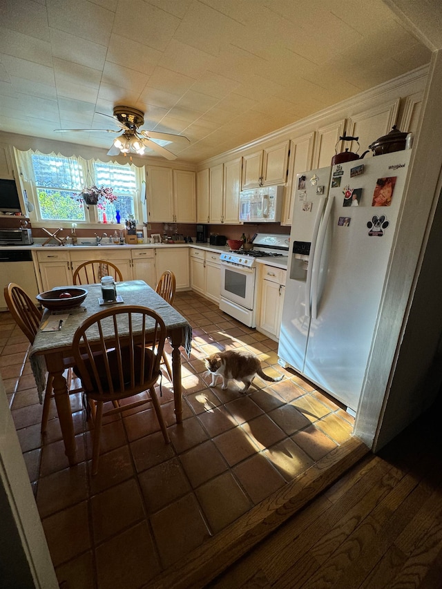 kitchen with ceiling fan, tile patterned flooring, and white appliances