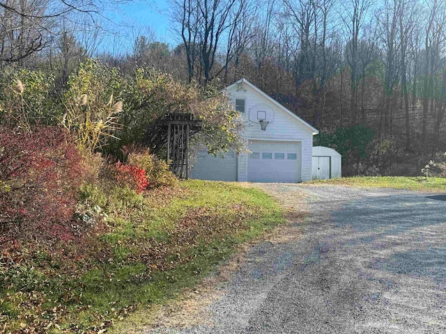 view of home's exterior featuring an outbuilding