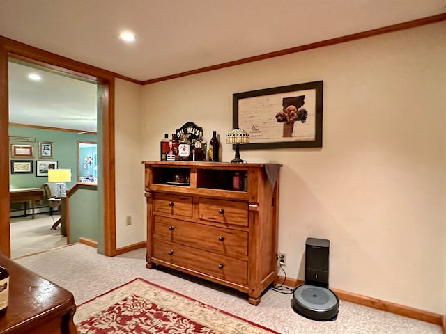 living area featuring light carpet and ornamental molding