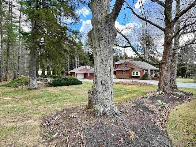 exterior space with a front yard