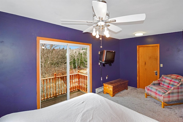 bedroom with access to outside, ceiling fan, carpet flooring, and a baseboard heating unit