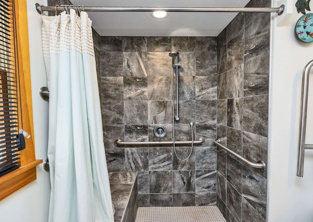 bathroom featuring curtained shower