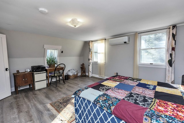 bedroom with multiple windows, dark wood-type flooring, a wall mounted AC, and lofted ceiling