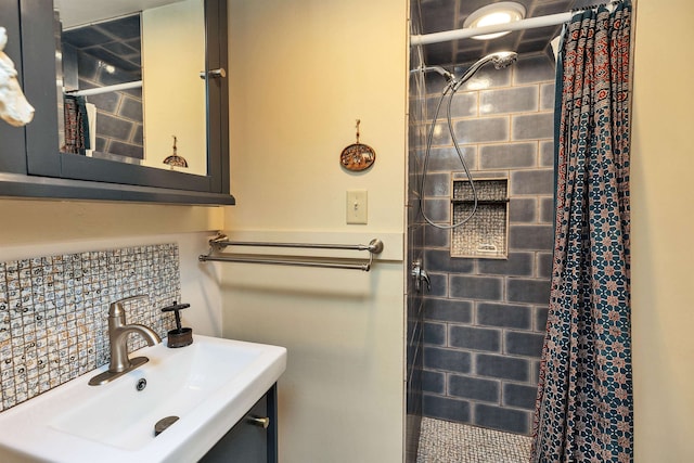 bathroom featuring sink and tasteful backsplash